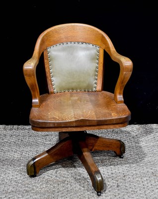 Lot 443 - A 20th century beech framed revolving desk...