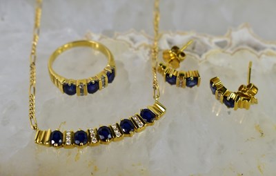 Lot 36 - An 18ct gold, sapphire and diamond parure set,...