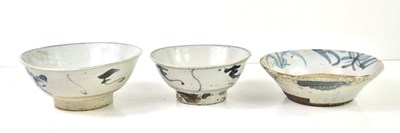 Lot 31 - A group of three Chinese blue and white bowls...