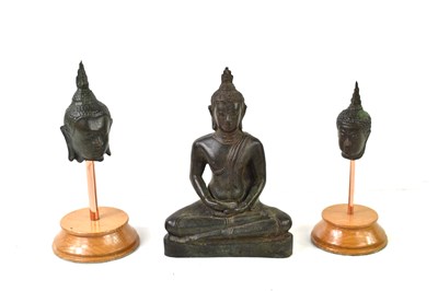 Lot 12 - A 19th century bronze figure of a seated...