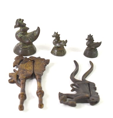 Lot 11 - Two brass Betel nut crackers together with...