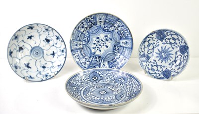 Lot 29 - Four Chinese export blue and white plates to...