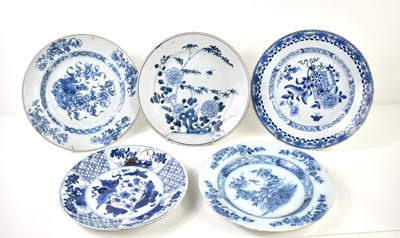 Lot 23 - Four Chinese blue and white plates to include...
