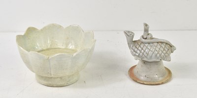 Lot 24 - A Chinese celadon glazed ten lobed lotus...