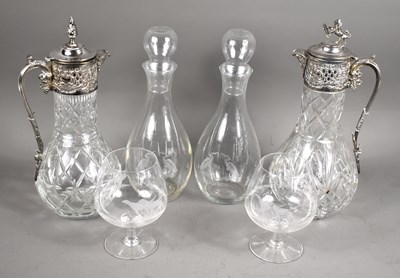 Lot 132 - Two silver plated and cut crystal claret jugs,...