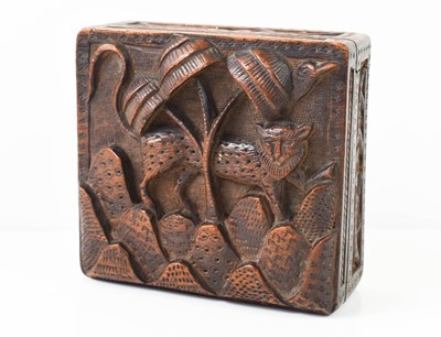 Lot 80 - An antique hardwood carved box, depicting a...