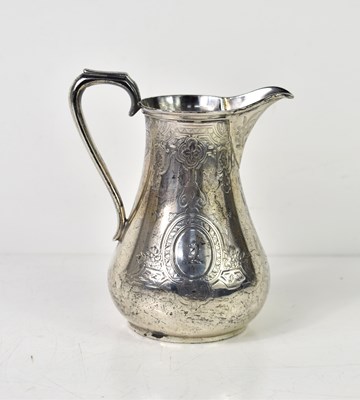 Lot 158 - A Victorian silver cream jug, engraved with...