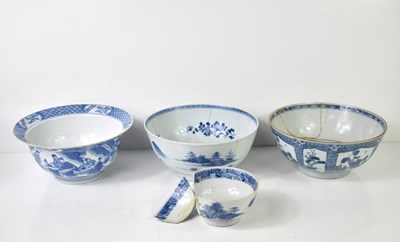 Lot 3 - A group of four Chinese blue and white bowls,...
