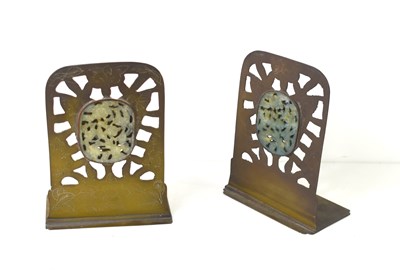 Lot 19 - A pair of Chinese brass and carved jade...