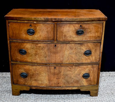 Lot 352 - A 19th century mahogany bow front chest of...