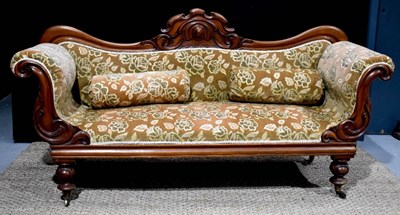 Lot 389 - A Victorian mahogany settee, the swept back...