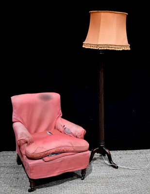 Lot 379 - A Howard style low armchair, the oak carved...