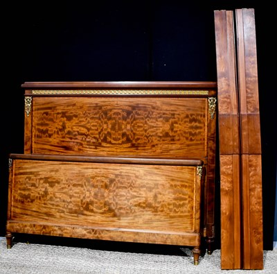 Lot 393 - A Regency style reproduction flame mahogany...