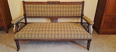 Lot 370 - An Edwardian bedroom settee, with carved oak...