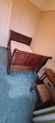 Lot 378 - A 19th century mahogany single sleigh bed, the...