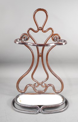Lot 361 - An early 20th century cast umbrella stands, in...