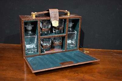 Lot 120 - A vintage crocodile skin clad travelling...