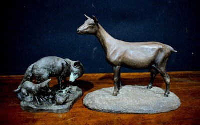 Lot 315 - Two sculptures; one of a fox and fox cub, the...