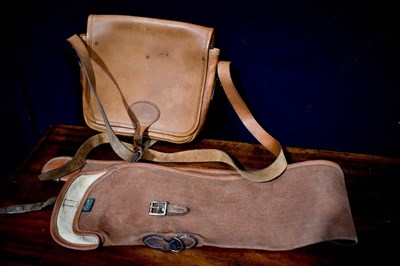 Lot 114 - A vintage leather gun cartridge bag, together...
