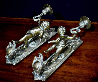 Lot 341 - A pair of French gilt metal candle sconces,...