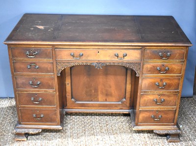 Lot 381 - A mahogany pedestal desk with inset leather...