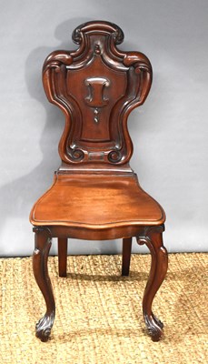 Lot 351 - A Victorian mahogany hall chair with carved...