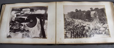 Lot 176 - An album of a series of photographic views...