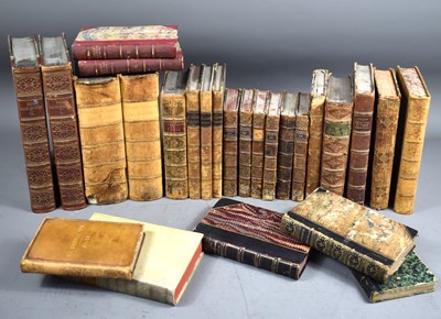 Lot 204 - A collection of antique leather bound books to...