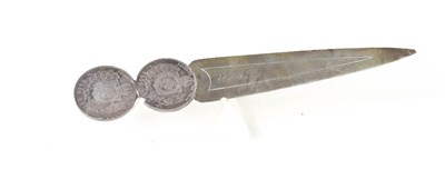 Lot 136 - An antique white metal letter opener,...