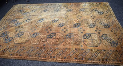 Lot 405 - An Afghan Ersari Turkmen wool rug featuring a...