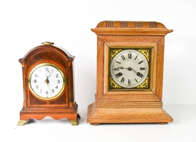 Lot 86 - An early 20th century pale oak cased mantle...
