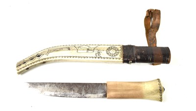 Lot 4 - A vintage Sami knife, made from reindeer...