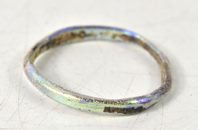 Lot 2 - Antiquities: An ancient Roman child's glass...