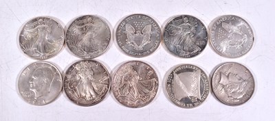 Lot 301 - A group of seven 1oz silver Liberty dollars,...