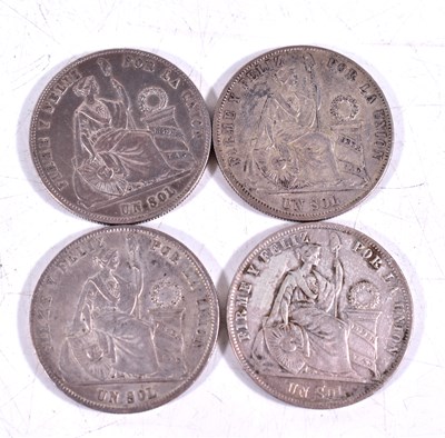 Lot 258 - Four Peru silver Sol coins, dated 1869, 1870,...