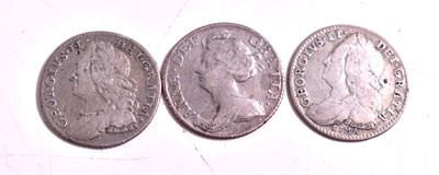 Lot 216 - A Queen Anne silver sixpence together with two...