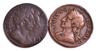 Lot 212 - A William & Mary copper farthing dated 1694,...