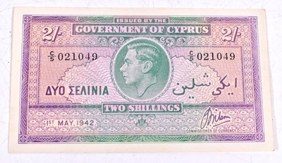 Lot 295 - A Government of Cyprus 2 shillings banknote,...