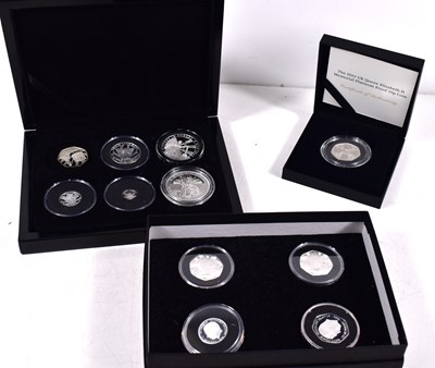 Lot 297 - A group of silver and other coins to include a...