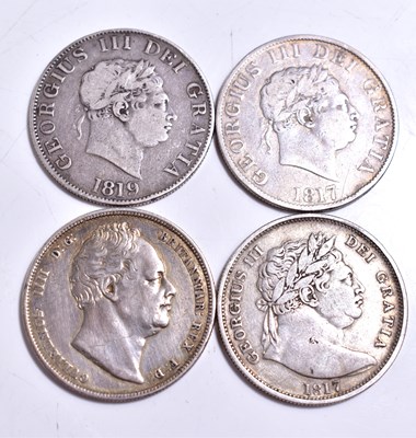 Lot 230 - A group of silver coins to include three...