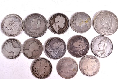 Lot 289 - A collection of silver coins to include a...