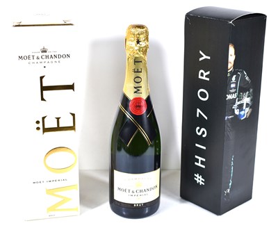 Lot 423 - Formula 1 memorabilia: A bottle of Moet &...