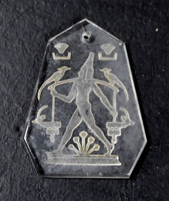 Lot 10 - An Art Deco Egyptian Revival intaglio crystal...