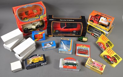 Lot 406 - A collection of diecast vehicles, sealed in...