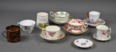 Lot 121 - A group of porcelain to include coffee cans,...