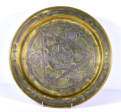Lot 163 - An Islamic brass, copper and white metal...