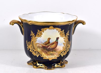 Lot 76 - A Lynton Porcelain twin handled porcelain...