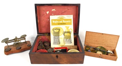 Lot 466 - A Victorian box containing various scales and...