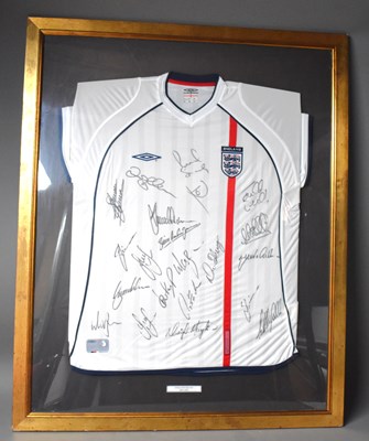 Lot 419 - A framed 2001-2002 England football shirt...
