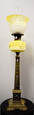 Lot 18 - A 19th century duplex oil lamp, with yellow...